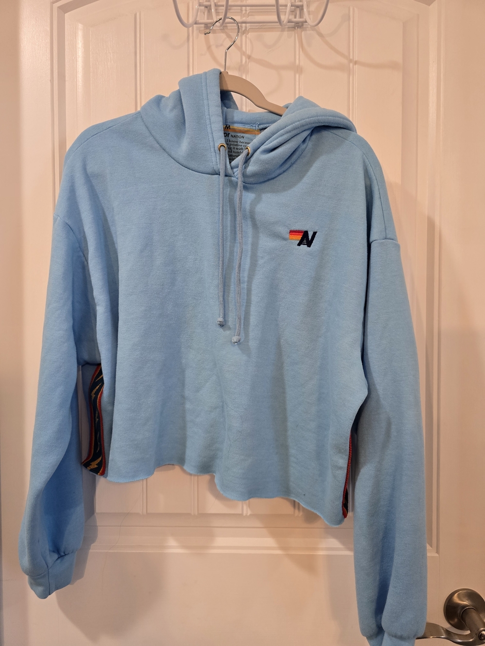 Aviator Nation Light Blue Cropped Hoodie with Rainbow Logo
